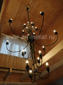 Large wrought iron ceiling chandelier.